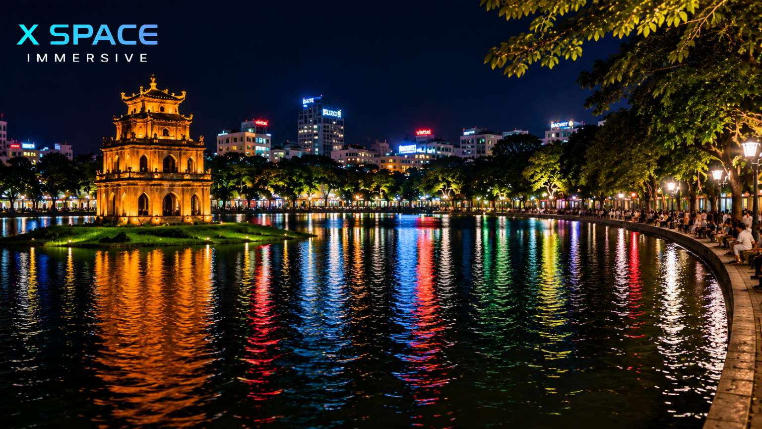 Hoan Kiem Lake at night with Turtle Tower illuminated in Hanoi