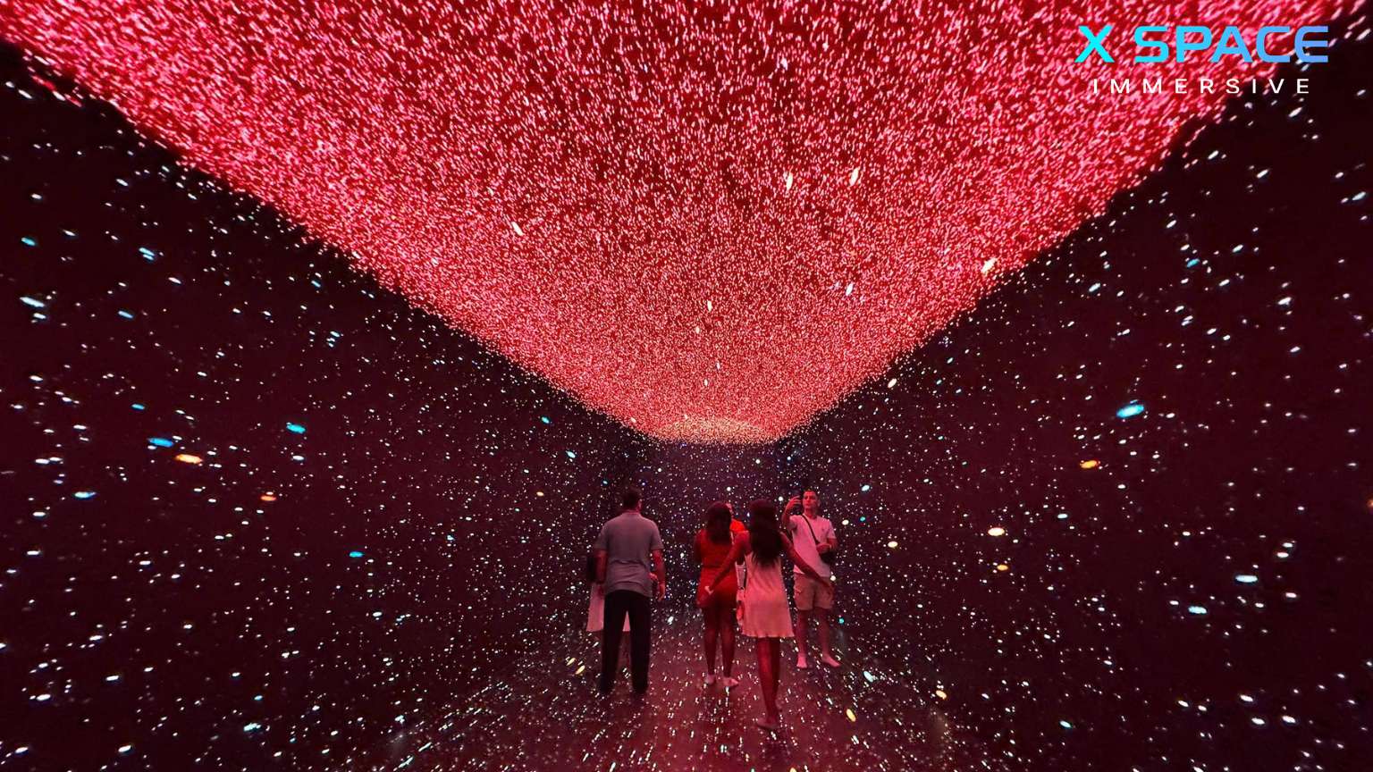 Visitors enjoying X Space Immersive digital art experience in Hanoi