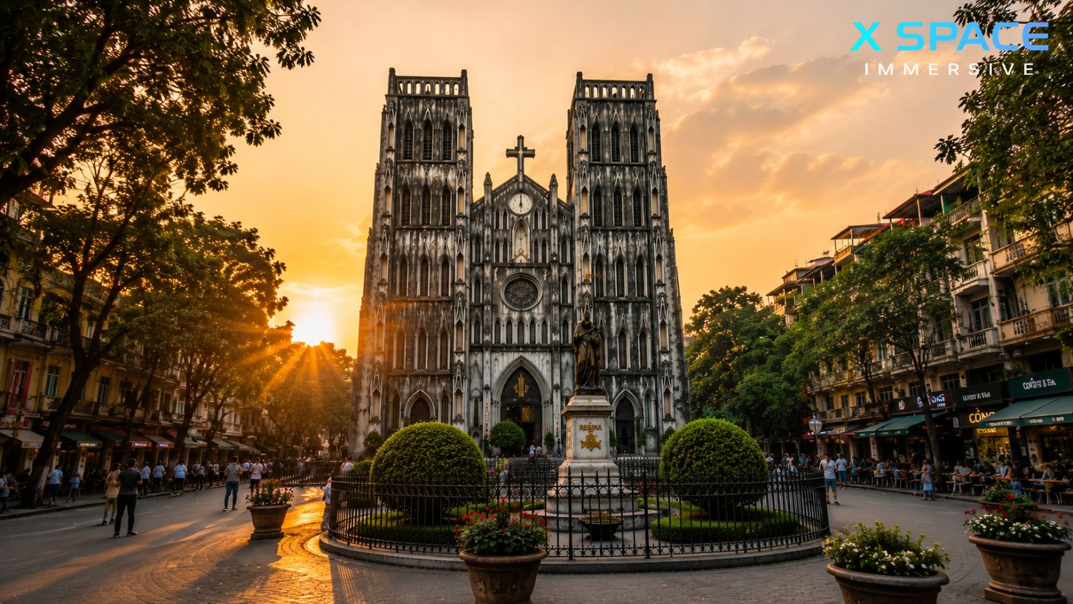 Cathedral Hanoi Vietnam at sunset with golden light over St Joseph's Cathedral