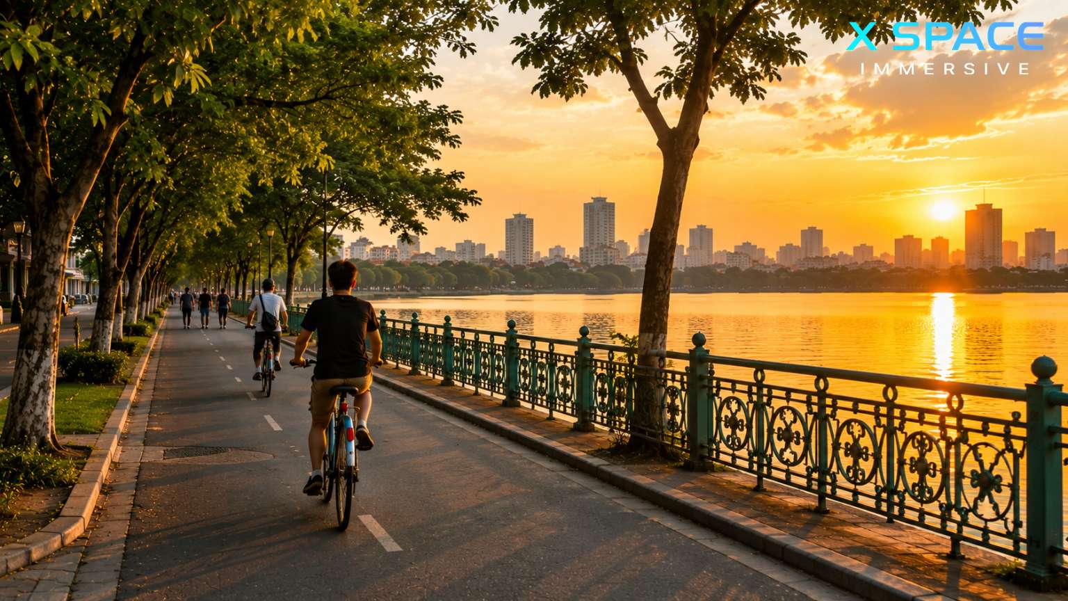 Cyclists riding along the scenic West Lake Hanoi cycling route
