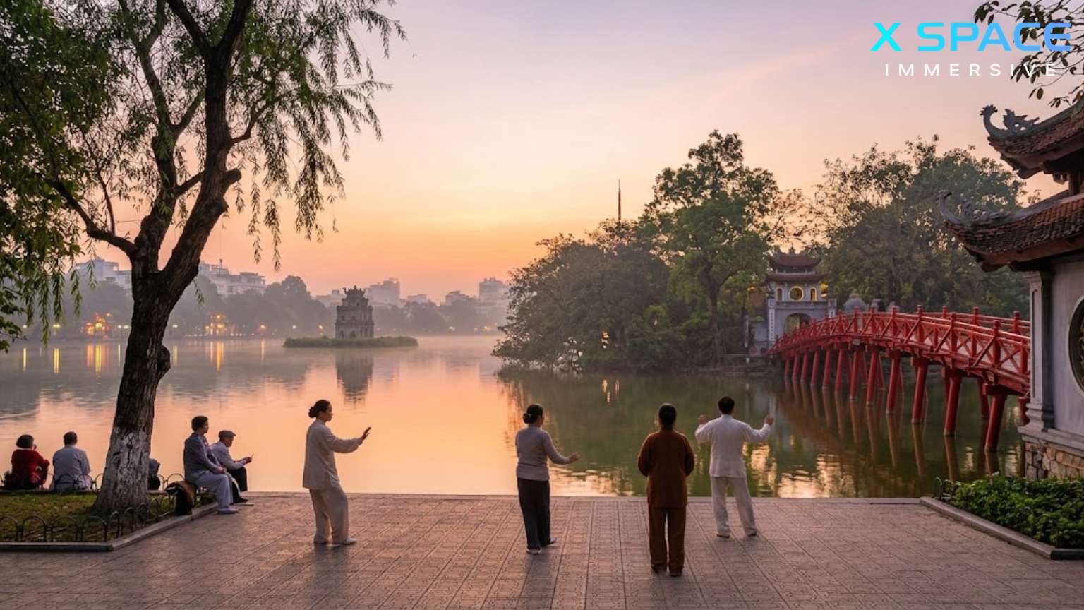 A peaceful sunrise view of Hoan Kiem Lake in Hanoi with Turtle Tower and the red Huc Bridge reflecting in the calm water.