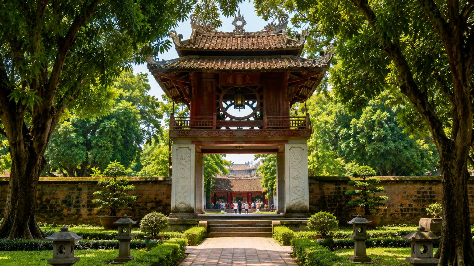 Temple of Literature entrance gate surrounded by peaceful gardens