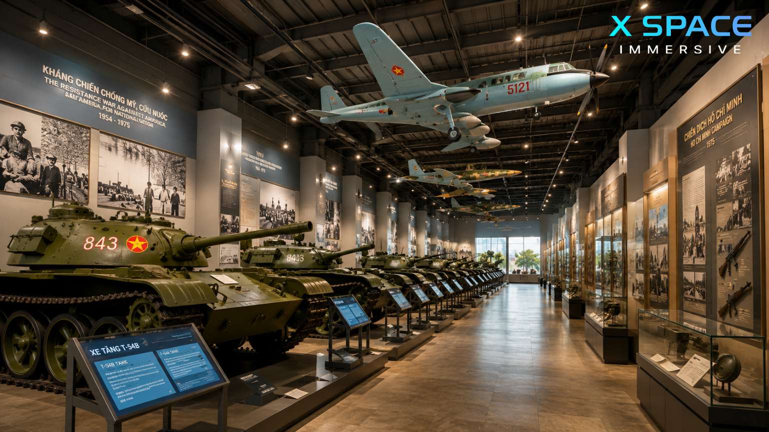 Indoor exhibition hall at Vietnam Military History Museum Hanoi displaying military vehicles and aircraft
