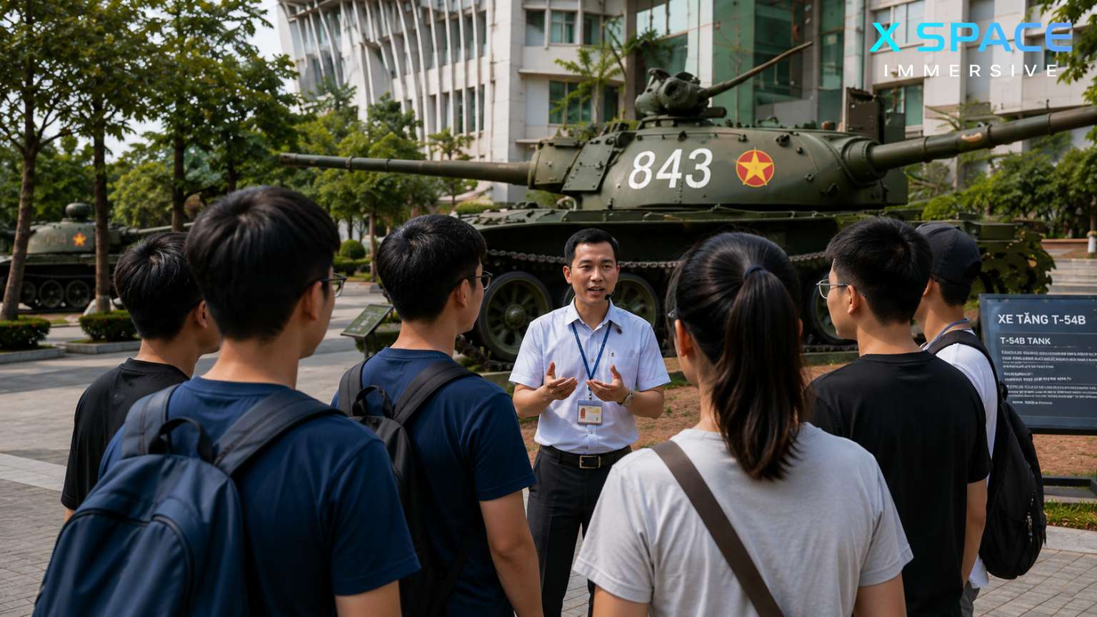 Guided tour at Vietnam Military History Museum Hanoi with visitors learning about military history