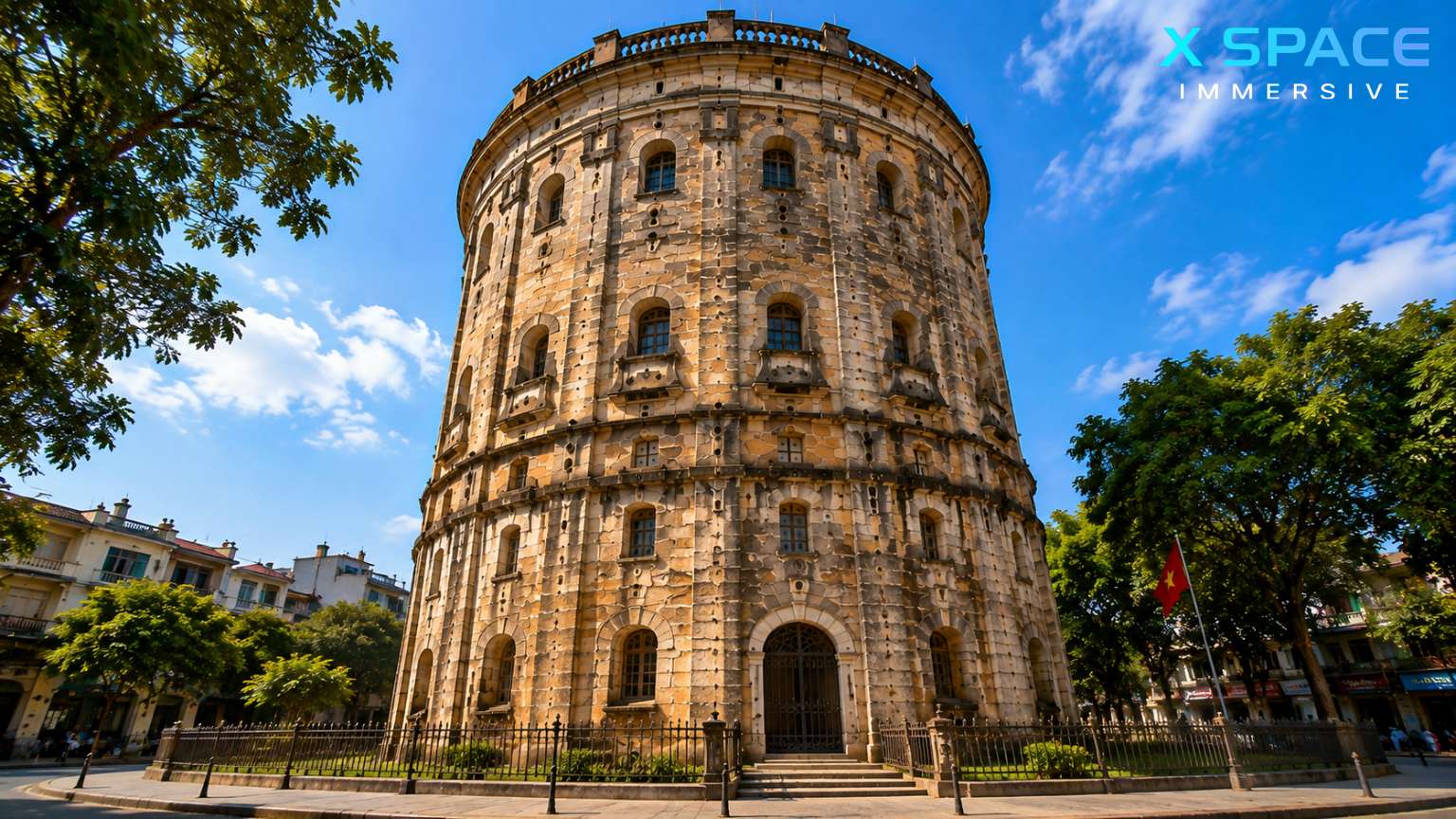 French colonial architecture of Hang Dau Water Tower with circular stone structure and arched windows