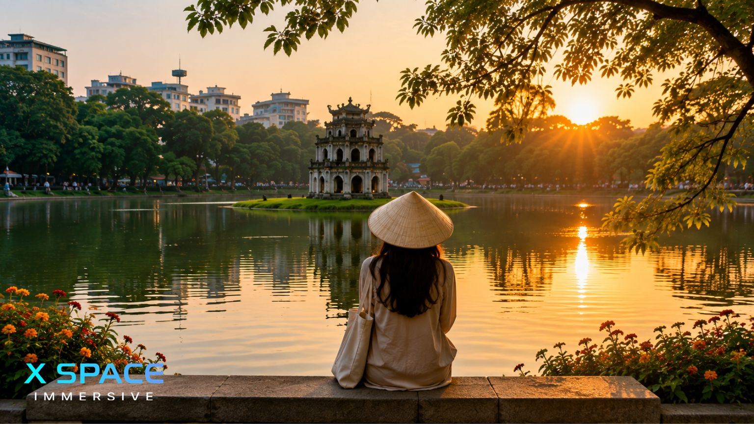 Hoan Kiem Lake at sunset in Hanoi with a solo traveler enjoying the view
