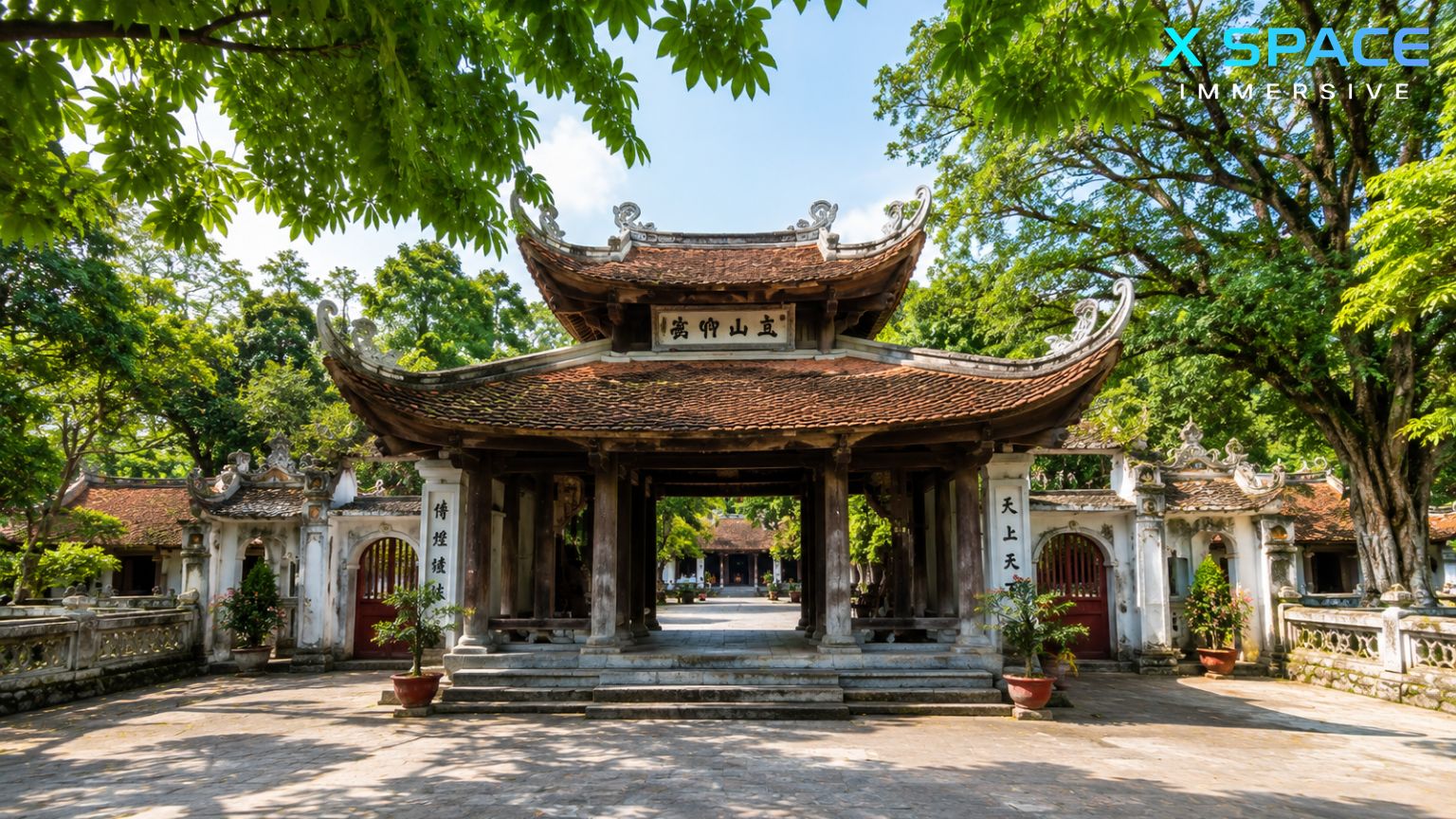 Traditional architecture of Thay Pagoda with ancient tiled roofs and courtyard