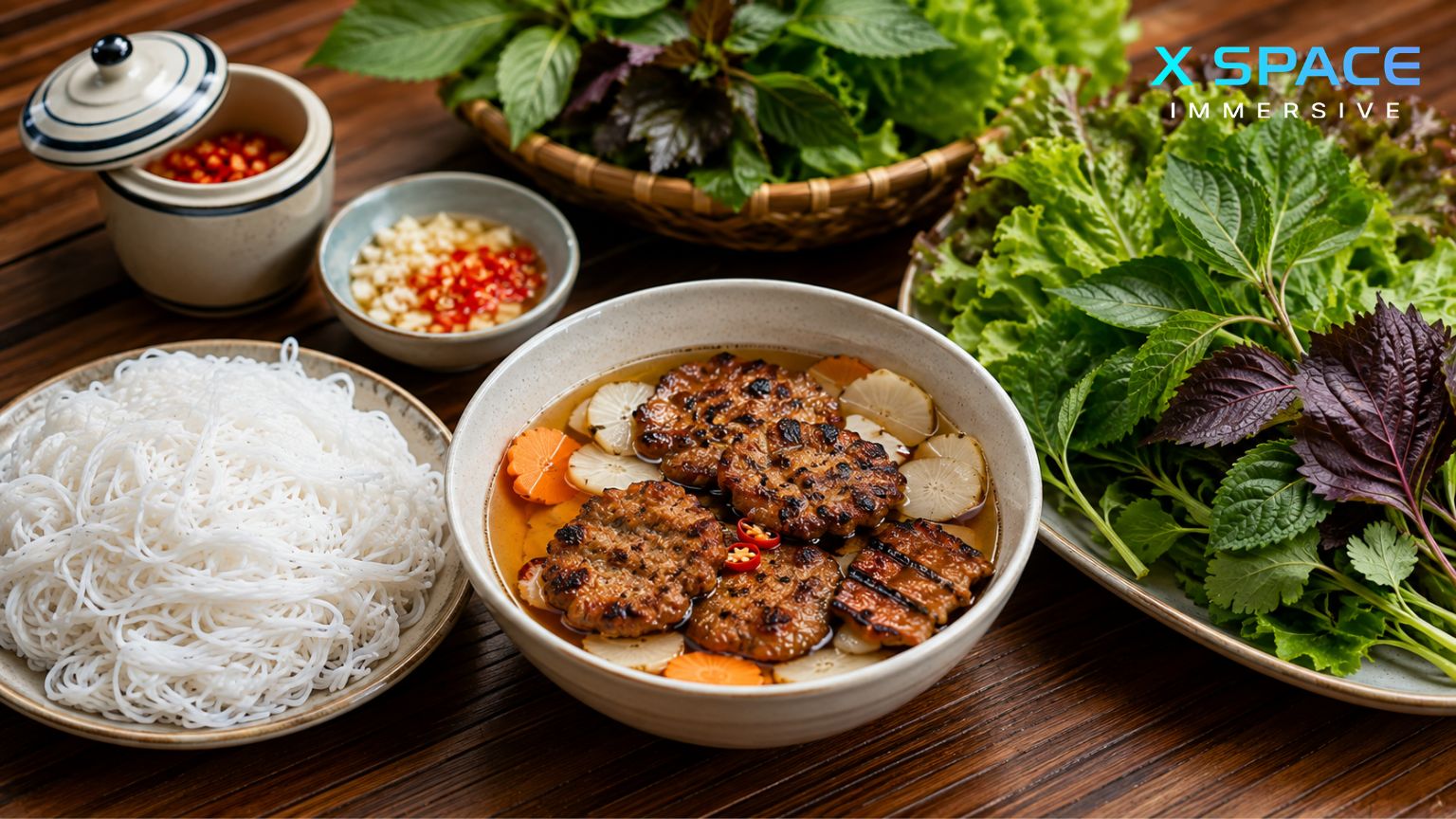 Traditional bun cha in Hanoi with grilled pork, rice vermicelli, herbs and Vietnamese dipping sauce