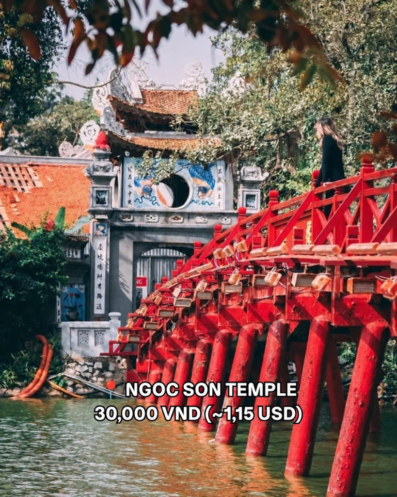 The red Huc Bridge leading to Ngoc Son Temple on Hoan Kiem Lake