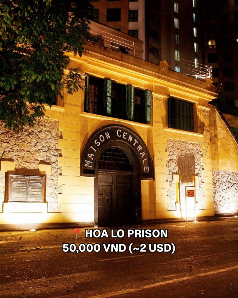 The Maison Centrale entrance of Hoa Lo Prison in Hanoi at night