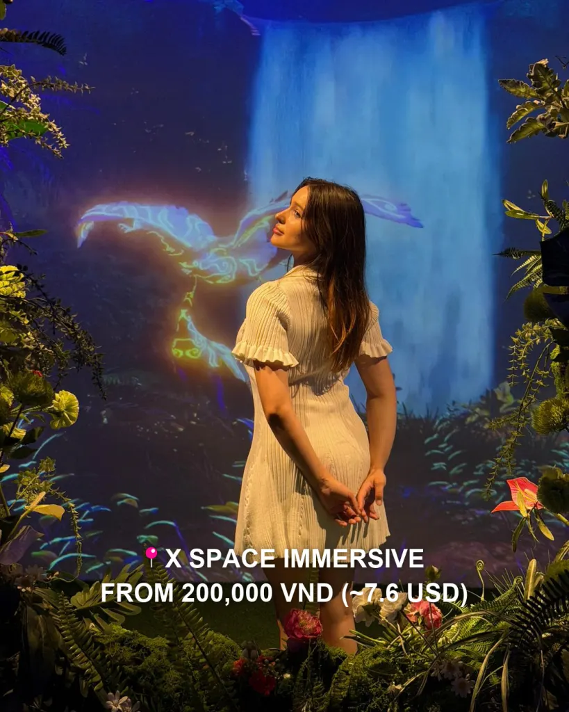 A visitor in the jungle waterfall room at X Space Immersive, one of the newest things to do in Hanoi